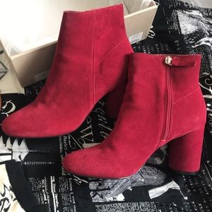 Red ankle boots.